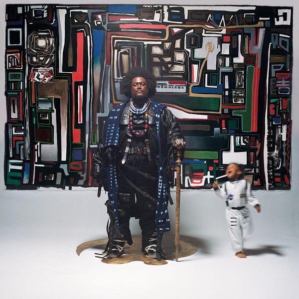 Selected album cover with two figures against abstract artwork